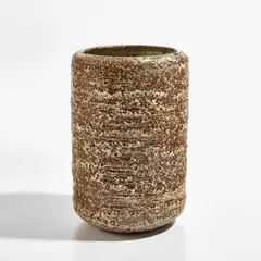 Lucie Rie, Early vase, circa 1934, Earthenware, layered cream and brown glazes with an integral pitted texture