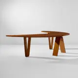 André Bloc, "Boomerang" desk, designed for the Villa Bellevue, Meudon, France, circa 1951, Oak, oak-veneered wood