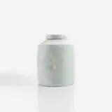 Lidded jar by Edmund de Waal, circa 1997, Porcelain, celadon glaze, sold Dec 2022
