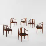 Hans J. Wegner, Set of six "China" armchairs, model no. 4283, designed 1944, executed 1969-1970, Brazilian rosewood, vinyl upholstery