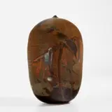"Closed Form" by Toshiko Takaezu, 1990s, Glazed porcelain, offered Dec 2022