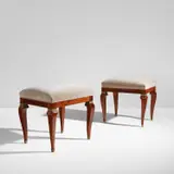 Pair of stools, from Casa Bonomi, Milan by Gio Ponti and Emilio Lancia, circa 1928, Walnut, brass, fabric upholstery, sold Dec 2022