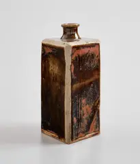 Bottle by Shoji Hamada, circa 1960, Stoneware, tenmoku glaze with wax resist, sold Feb 2021