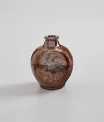Flask by Shoji Hamada, circa 1960, Stoneware with iron glaze and inlaid design, sold Feb 2021