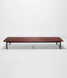 Low bench by Charlotte Perriand, circa 1958, Stained pine, painted steel, sold Feb 2021