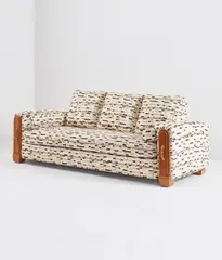 "Théodore" sofa by Jules Leleu, circa 1952, Fabric upholstery, walnut, walnut-veneered wood, brass, glass, chromium-plated metal, sold Feb 2021