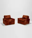 Peter Marino, Pair of club chairs, 2002, Hide upholstery, oak