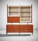 Cabinet with illuminated bookcase, model no. 2140, from the "Modern by Singer" series by Gio Ponti, circa 1956, Walnut, walnut-veneered wood, lacquered wood, brass, sold Jun 2021