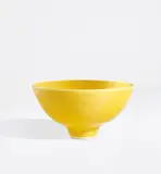 Footed bowl by Lucie Rie, circa 1980, Porcelain, "American" yellow glaze, sold Jun 2021