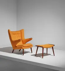 Hans J. Wegner, “Papa Bear” armchair, model no. AP19, and ottoman, designed 1951, Teak, fabric upholstery