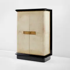 Cabinet by Jacques Adnet, 1940s, Parchment-covered wood, painted wood, brass, sold Dec 2021