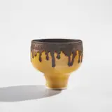 Lucie Rie, Footed bowl, circa 1978, Porcelain, yellow glaze with golden manganese lip