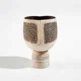 Pot on cylindrical foot with vertical impression by Hans Coper, circa 1975, Stoneware, layered white porcelain slips and engobes over a body with textured and incised linear designs, the interior , sold Dec 2021