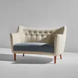 Rare sofa, designed for a "Bachelor's Apartment" for the "Tidens Møbler 1947" exhibition, Copenhagen by Finn Juhl, circa 1947, Beech, fabric upholstery, sold Dec 2021