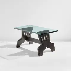 "Tenaglia" coffee table by Pietro Chiesa, circa 1938, Ebonized oak, glass, sold Jul 2020