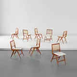Martin Eisler, Set of eight dining chairs, 1960s, Pau Ferro, cane, leather upholstery