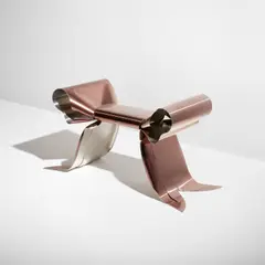 "Pouf Ruban" stool by Maria Pergay, 2007, Bronze tinted steel, sold Jul 2020