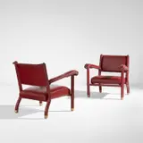 Jacques Adnet, Pair of armchairs, 1950s, Leather-covered metal, leather upholstery, brass-plated metal