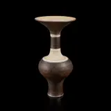 Vase with flaring lip by Lucie Rie, circa 1974, Porcelain, manganese glaze with sgraffito design, matte beige shoulder and lip, three inlaid blue lines around neck and , sold Jul 2020