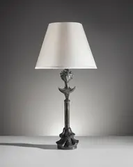 Alberto Giacometti, "Tête de femme" table lamp, designed circa 1934, later cast, Patinated bronze, fabric shade