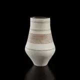 Vase with oval lip by Lucie Rie, circa 1976, Porcelain, unglazed with inlaid manganese design, and golden manganese glaze on interior, sold Jul 2020