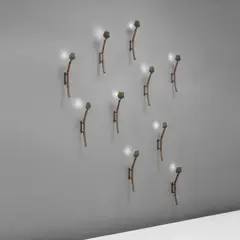 Kim Moltzer, Set of ten "Bamboo" wall lights, circa 2005, Bronze, painted metal, glass