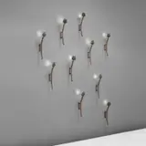 Kim Moltzer, Set of ten "Bamboo" wall lights, circa 2005, Bronze, painted metal, glass