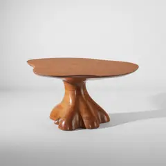 Dining table by Wendell Castle, 1974, Stack-laminated cherry, sold Jul 2020