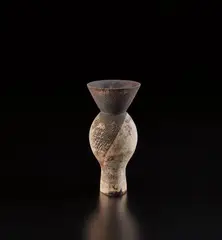 Flared vase by Hans Coper, circa 1958, Stoneware, layered white porcelain slips and engobes over a textured body, the interior with manganese glaze, sold Dec 2020