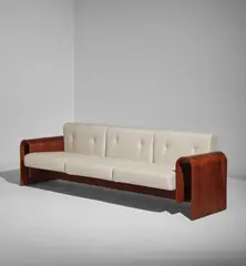 Sofa, designed for the SESC Hotel, Rio de Jaineiro by Oscar Niemeyer, designed 1990, produced 2007, Imbuia-veneered wood, fabric upholstery, sold Dec 2020