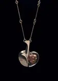 Björn Weckström, "Avaruusomena" (Space Apple) pendant necklace, Designed 1975, produced 1976, Mould-cast silver and acrylic
