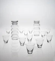 Nuutajärvi Notsjö, Two cocktail mixers and twelve cocktail tumblers, model nos. 2544 and 2744, Designed 1956, Glass