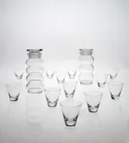 Nuutajärvi Notsjö, Two cocktail mixers and twelve cocktail tumblers, model nos. 2544 and 2744, Designed 1956, Glass