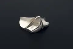 "Labyrinth" broach by Björn Weckström, 1977–2013, Mould-cast silver, offered Sep 2019