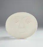 Geometric face (Visage géométrique) by Pablo Picasso, 1956, White earthenware oval dish; ceramic, Madoura edition, sold Oct 2019