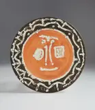 Pablo Picasso, Face in thick relief (Visage en gros relief), 1959, White earthenware round dish, with decoration in engobes and pastel crayon under partial brushed glaze