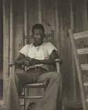 A Negro Boy Who Wants to go to High School, His Father is a Sharecropper near Earle, Arkansas by Dorothea Lange, 1935, Gelatin silver print, sold Apr 2019
