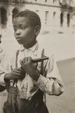 Helen Levitt, Boy with Gun, circa 1942, Gelatin silver print, probably printed in the 1950s