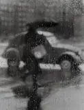 Sabine Weiss, La 2CV sous la pluie, Paris, 1957, Gelatin silver print, printed later
