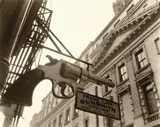 Gunsmith and Police Department, 6 Centre Market Place, Manhattan by Berenice Abbott, 1937, Gelatin silver print, sold Oct 2019