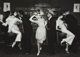 Audrey Hepburn and Art Buchwald with Simone, Barbara Mullen, Frederick Eberstadt, and Dr. Reginald Kernan, Evening dresses by Balmain, Dior, Patou, Maxim's, Paris, August by Richard Avedon, 1959, Gelatin silver print, printed 1997, sold Oct 2019