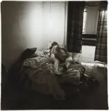 Couple in bed under paper lantern, N.Y.C. by Diane Arbus, 1966, Gelatin silver print, printed later by Neil Selkirk, sold Oct 2019