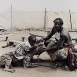 Pieter Hugo, Mummy Ahmadu and Mallam Mantari Lamal with Mainasara, Abuja, Nigeria from The Hyena and Other Men