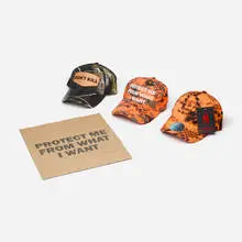 Jenny Holzer, Set of three Trucker Hats (from the Survival series); Protect Me From What I Want bag, printed and embroidered fabric, printed paper
