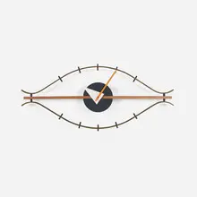 Eye wall clock, model 2238 by George Nelson & Associates, walnut, brass, enameled metal, sold Aug 2026