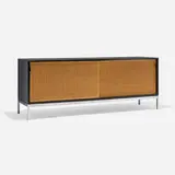 Florence Knoll, Sliding door cabinet, c. 1965, laminate over wood, cane, matte chrome-plated steel, maple, leather