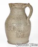 C.T. Brown, Exceptional Salt-and-Alkaline-Glazed Stoneware Pitcher w/ Profuse Punchwork, Inscribed "C.T. Brown / Rock MiLLS," Alabama, circa 1900, Alkaline-glazed stoneware