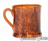 Glazed JOHN BELL / WAYNESBORO Redware Mug, c1850-80 by John Bell, c1850-80, Redware, sold Nov 2024