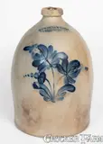 2 Gal. COWDEN & WILCOX / HARRISBURG, PA Stoneware Jug w/ Floral Decoration by Cowden & Wilcox, circa 1865, Stoneware, sold Nov 2023
