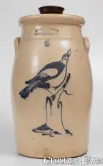 Fine 6 Gal. OTTMAN BROS. & CO. / FORT EDWARD, NY Stoneware Churn w/ Large Bird-on-Stump Decoration by Ottman Bros. & Co., circa 1875, Stoneware, sold Aug 2023